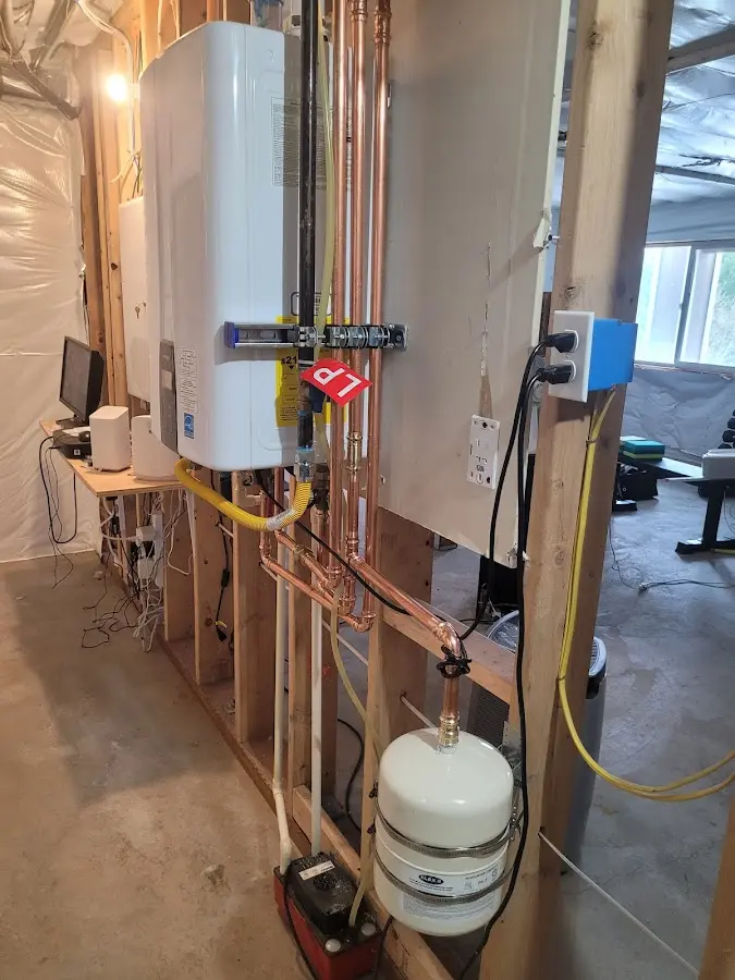 Licensed plumber repairing a kitchen sink in Montclair