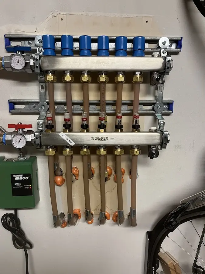 Plumber performing Water Heater Repair at a residential property in Montclair